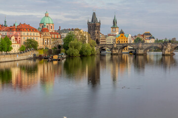 Fototapeta premium Skyline of the Old Town in Prague with the Charles Bridge, Czech Republic