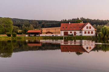 Fototapeta na wymiar Pond in Holasovice village, Czech Republic