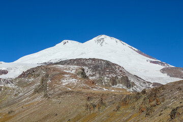 Close up view on Mount Elbrus from the acclimatization trail to waterfall
