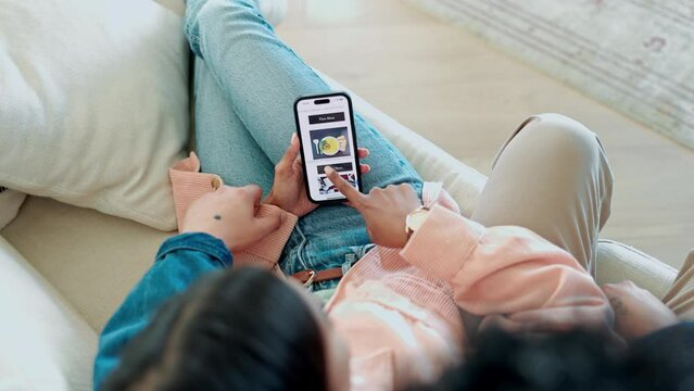 Couple, hands and phone for food delivery, restaurant menu and online shopping decision or choice on home sofa. People, user or customer scroll on mobile app of e commerce catalog or dinner on screen