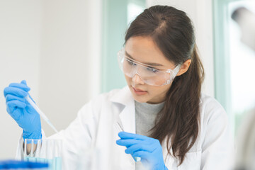 Medical development research laboratory, chemist or science scientist student hand in glove, drop...