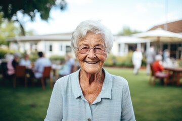 Smiling portrait of a happy senior caucasian woman in a nursing home