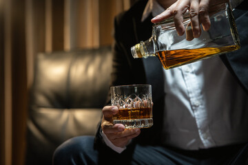 Businessmen in suits drinking  Celebrate whiskey.