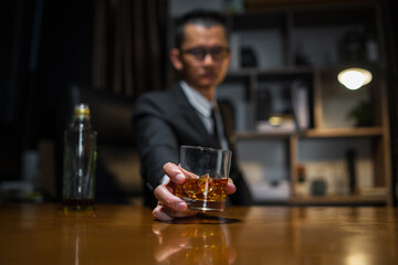 Businessmen in suits drinking  Celebrate whiskey.