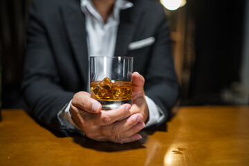 Businessmen in suits drinking  Celebrate whiskey.