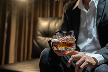 Businessmen in suits drinking  Celebrate whiskey.