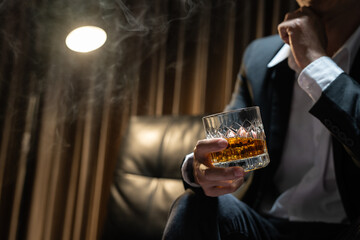 Businessmen in suits drinking  Celebrate whiskey.