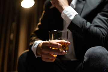 Businessmen in suits drinking  Celebrate whiskey.