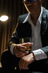Businessmen in suits drinking  Celebrate whiskey.