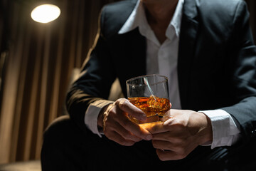 Businessmen in suits drinking  Celebrate whiskey.