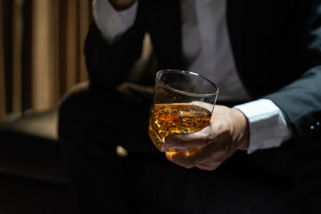 Businessmen in suits drinking  Celebrate whiskey.
