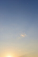 Obraz premium beautiful blue sky and cloud with golden ray sunrise in the morning, natural background