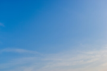 beautiful blue sky and cloud with golden ray sunrise in the morning, natural background