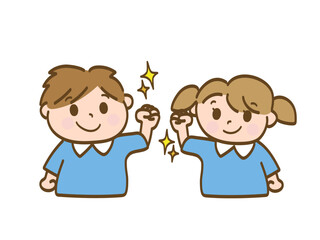 ガッツポーズで頑張ろうと励まし合う男の子と女の子_保育園児
