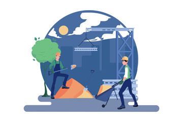 Construction worker pushing a sand trolley