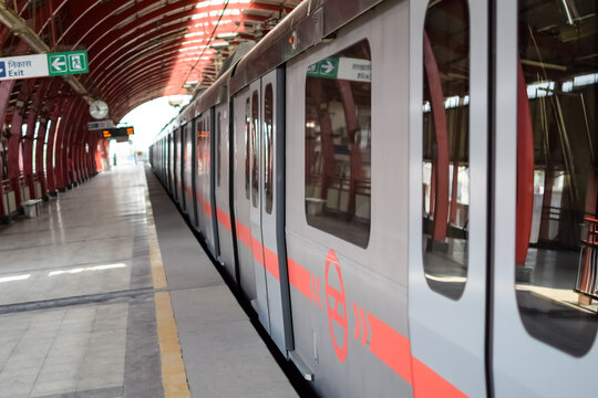 New Delhi India – August 10 2023 - Delhi Metro train arriving at Jhandewalan metro station in New Delhi, India, Asia, Public Metro departing from Jhandewalan station