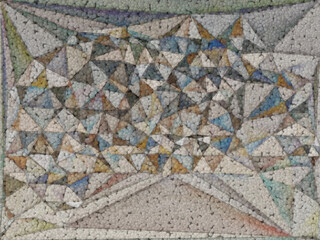 beaded texture on a cubist style pattern and triangular mosaic design in shades of light brown and grey