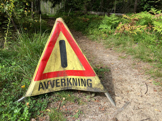 at the entrance to a lumbering area written in Swedish.