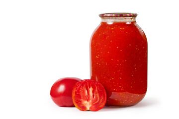 Glass jar with tomato juice on a white background. Fresh tomatoes and tomato juice.