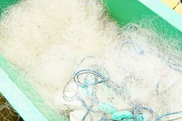fishing nets in green boxes