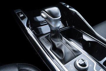 Automatic gear stick of a modern car. Modern car interior details. Close up view. Car inside....