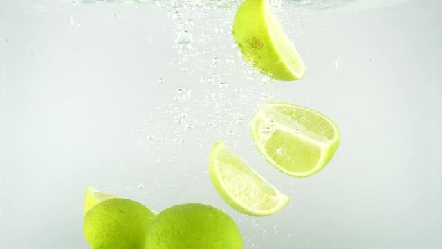 Limes Falling into the Water