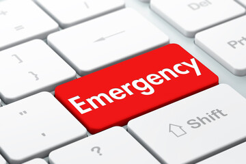 Concept of computer keyboard key with the word Emergency on it ready to press enter