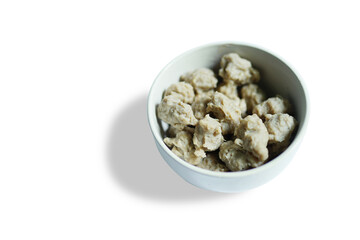 processed meat, meatballs in white bowl on plain background - Indonesian food