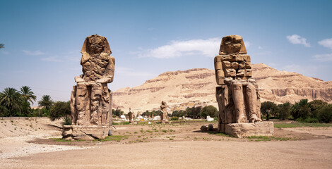 The Colossi of Memnon in the early morning in Luxor, Egpyt