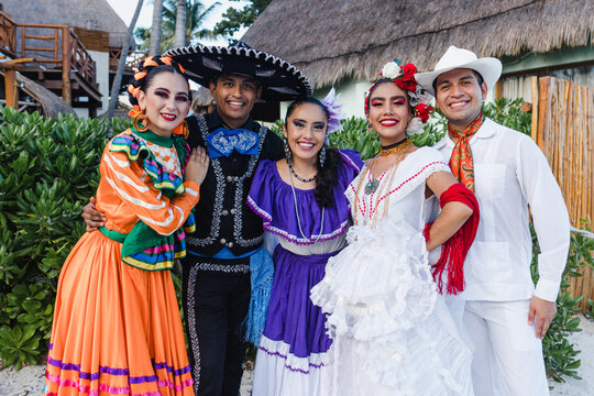 group of mexican dancers wearing traditional folk costume, portrait of young latin people in Mexico Latin America festival party, Independence day