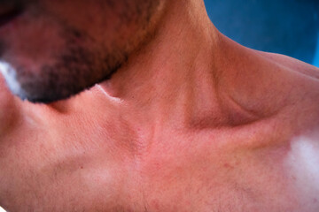 close up of male clavicles and neck