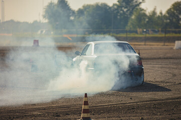 Drift Race Amidst Smoke