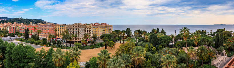 Fototapeta na wymiar Aerial panoramic view of Jardin Albert 1 garden, Old Town or Vielle Ville buildings and the Mediterranean Sea at sunset in Nice, South of France