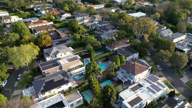 Sydney, Australia: Aerial drone footage of an upscale residential district with many houses with swimming pools of Bellevue Hill close to Rose Bay in Sydney. 
