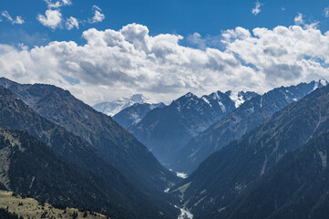 High-mountain valley of the Karakol River in Issyk-Kul region of Kyrgyzstan. High-mountain glaciers...