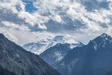 Fototapeta na wymiar Peak Karakol in Issyk-Kul region of Kyrgyzstan. High mountain glaciers of Kyrgyzstan.