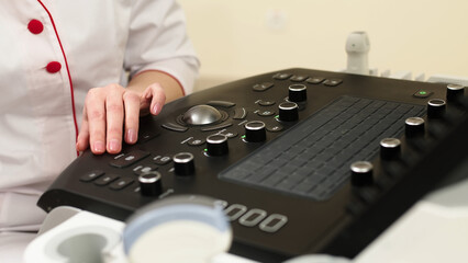 Close-up photo of an ultrasound scanner. Diagnostics. Sonography. Modern ultrasound machine.