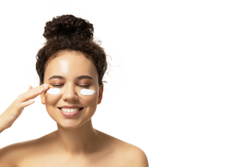 PNG,attractive girl applies cream on her face, isolated on white background