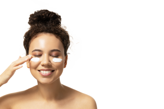 PNG,attractive girl applies cream on her face, isolated on white background