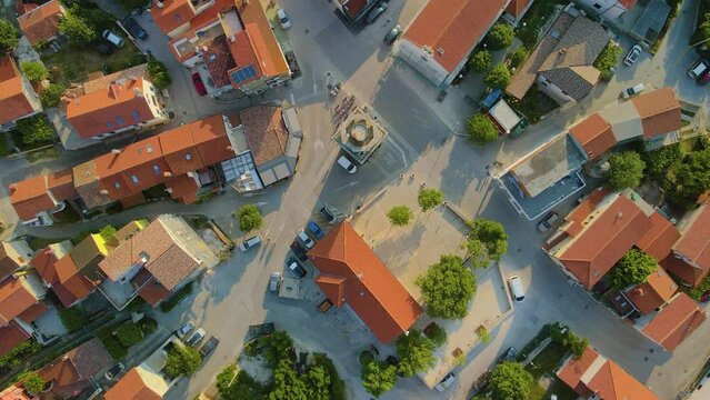 The stunning drone imagery highlights the breathtaking beauty that lies above downtown and artistically showcases the charming brown roofs of homes and wonderfully tidy streets