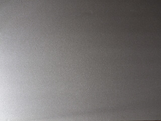 Silver gradient background. Gray shiny texture for background, design