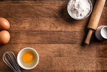 Baking background with flour, eggs, rolling pin.