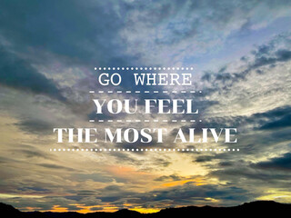 Life travel inspirational motivational quote - Go where you feel the most alive with blurred nature...