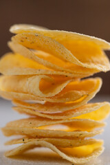 Potato chips on a light background