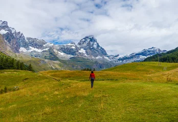 Photo sur Aluminium Europe du nord Breuil-Cervinia (Italy) - A view of Cervinia mountain town with Cervino mount peak of Alps, trekking paths and Lago Blu touristic lake. In Valle d'Aosta region, north Italy.