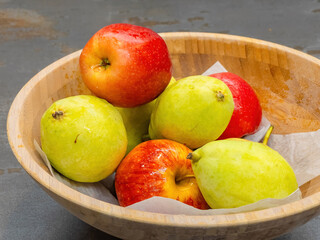 fruits plate with fresh grapes, pears, apples
