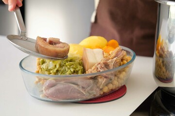 Homemade cocido madrileño, typical Spanish dish.