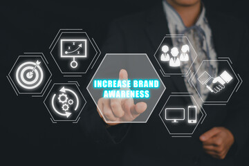 Increase brand awareness concept, Businesswoman hand touching increase brand awareness icon on virtual screen.