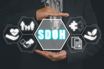 SDOH, Social Determinants Of Health concept, Businesswoman hand holding Social Determinants Of...