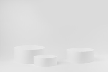Abstract three white round pedestals for cosmetic products as mockup on white background. Scene for presentation products, gifts, goods, advertising, design, sale, text, showing in simplicity style.